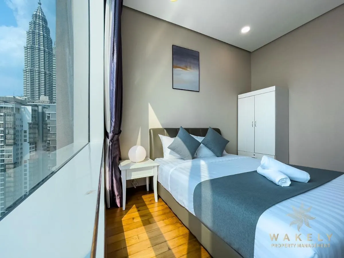 Апартаменты Soho Suites Klcc By Wakely Куала-Лумпур
